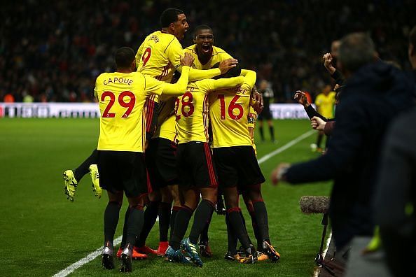 Watford players celebrate after scoring a late winner