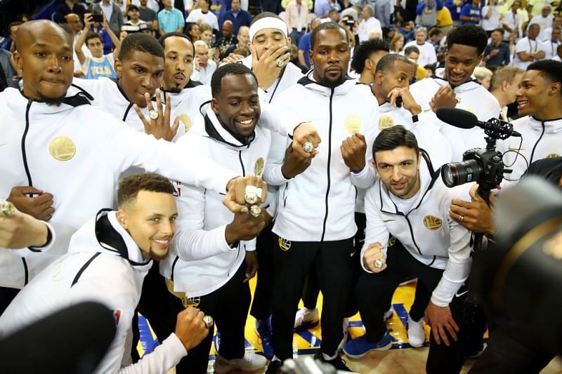 Warriors showing off their championships rings on NBA opening night. 
