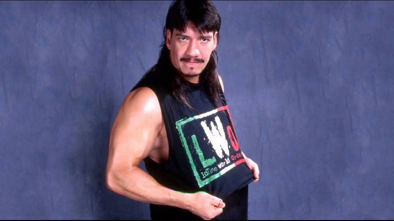 Eddie Guerrero posing for a photoshoot in  WCW