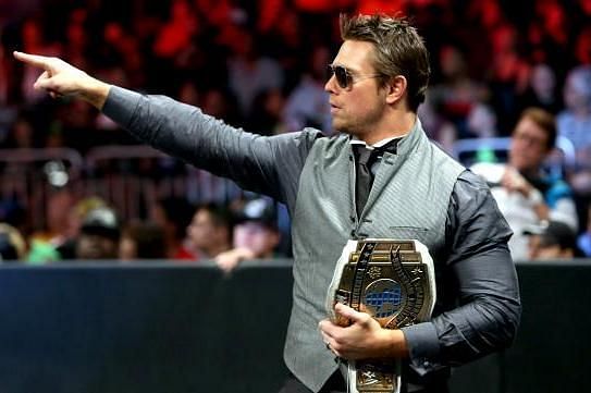 The Miz outside the ring with the Intercontinental Championship