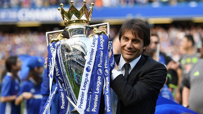 Antonio Conte with the Premier League trophy which Chelsea won at a canter last season