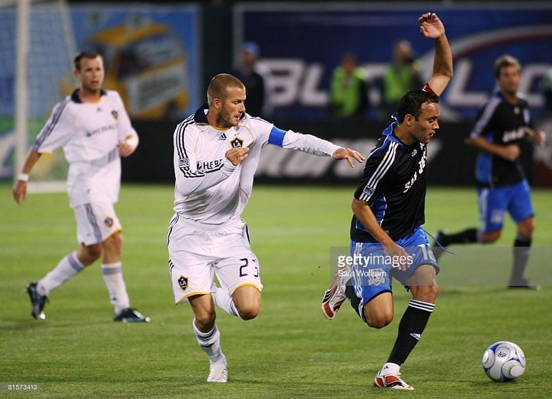 David Beckham fighting to gain control of the ball in the The California Clasico