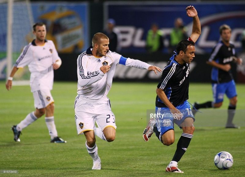 David Beckham fighting to gain control of the ball in the The California Clasico