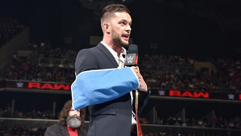 Finn Balor relinquishing his Universal Championship