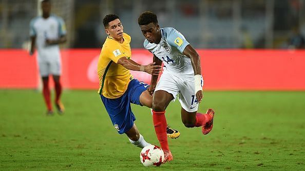 Paulinho and Hudson-Odoi in a duel