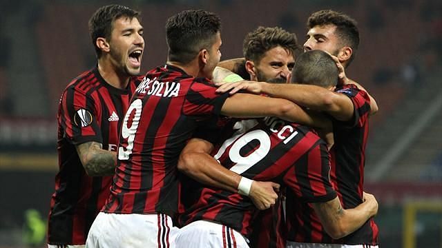 AC Milan players celebrating a goal in Europa League