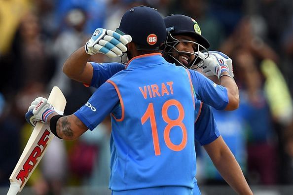 Rohit celebrates his century with Virat Kohli