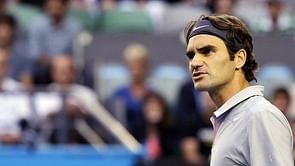 Roger Federer smashes racquet into net in anger in Swiss Indoors final