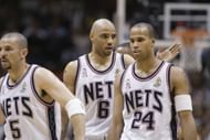 Kenyon Martin walks upcourt with Jason Kidd and Richard Jefferson