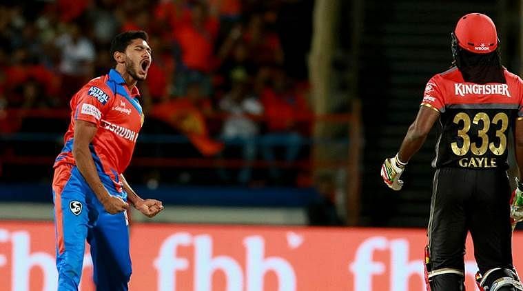 Basil Thampi celebrates after taking his first IPL wicket