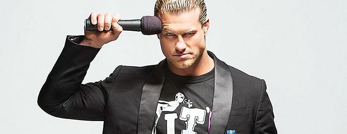 Dolph Ziggler holding a mic