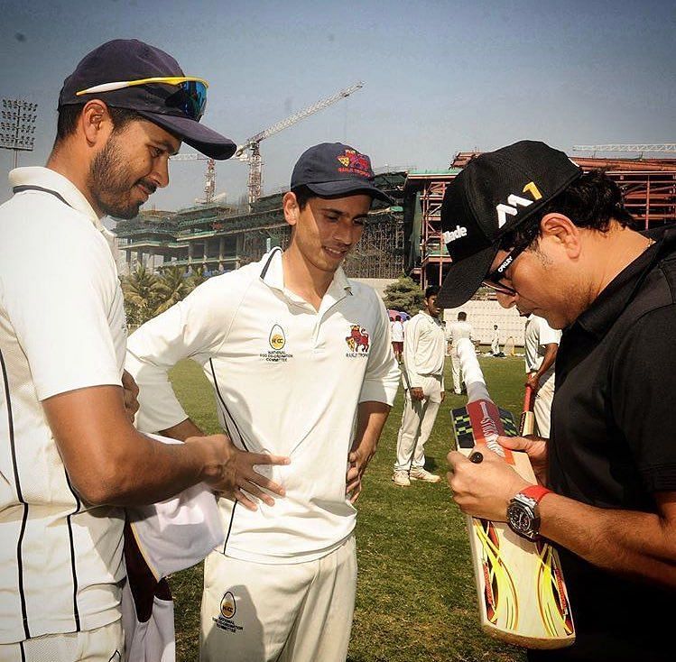 Lad with Sachin Tendulkar and Aditya Tare