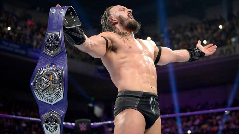 Neville applies the Rings of Saturn to a beaten down Aries to retain the WWE Cruiserweight Championship.