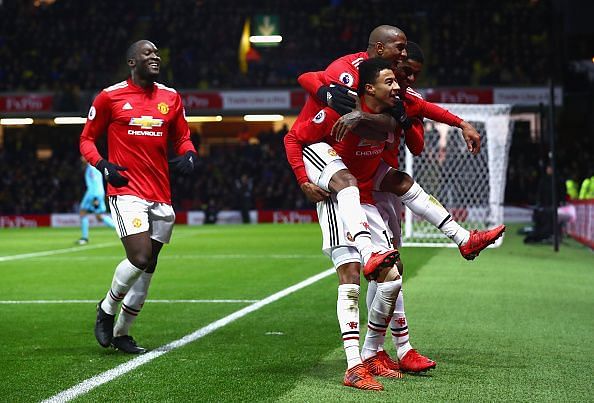 The Manchester United players celebrate a goal against Watford