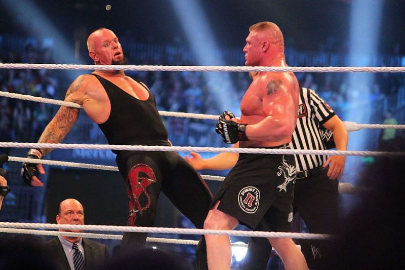 Taker in the ring with Brock Lesnar