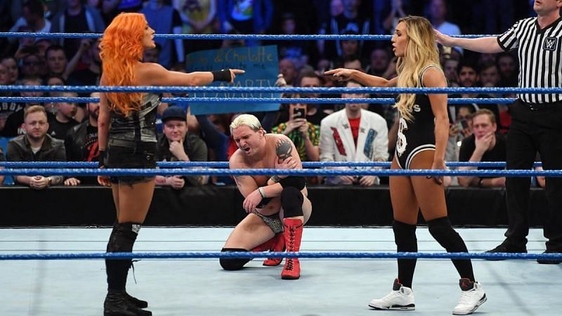 Carmella seemed ready to defend Ellsworth, before giving him a superkick instead