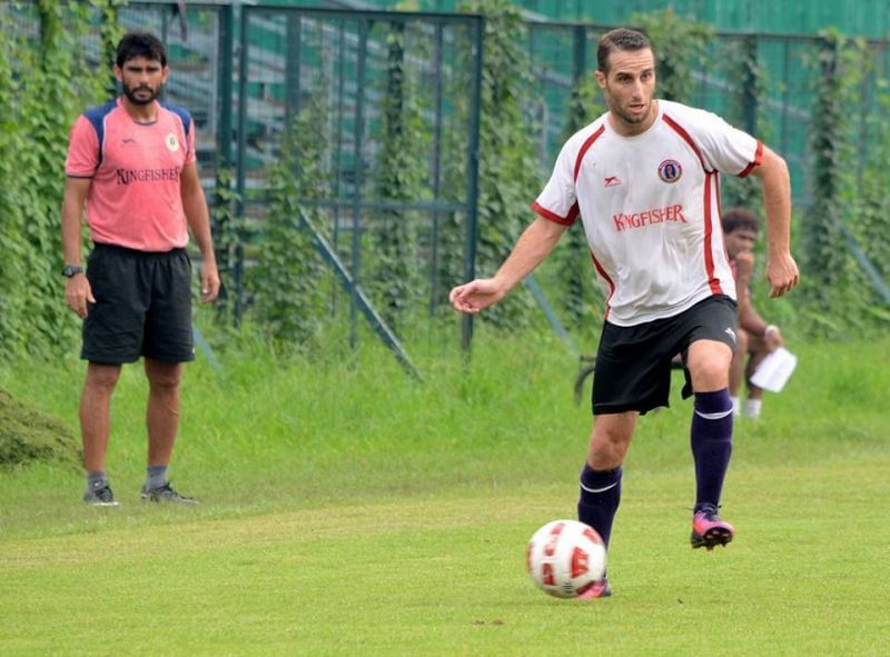Khalid Jamil overlooking a training session