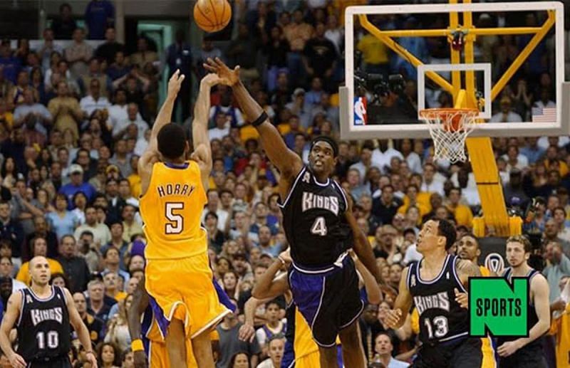Robert Horry with his game-winning shot over the Chris Webber. 
