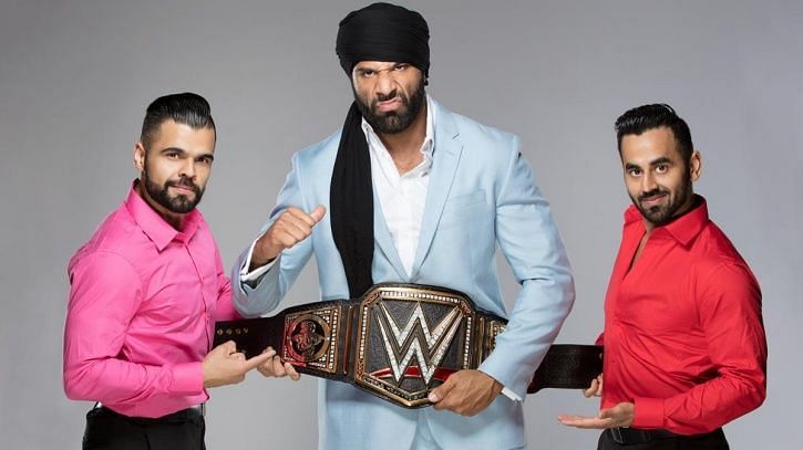 Sunil Singh (L) and Samir Singh (R) with the WWE World Champion Jinder Mahal (C)