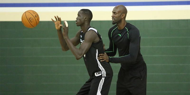 Thon Maker at practice with Kevin Garnett.