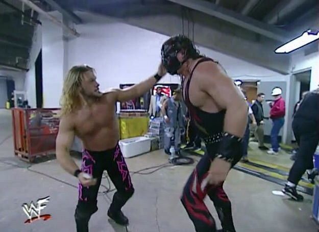 After calmly chiding Mideon (with their fists) for interrupting a spirited debate on the estate tax, Jericho and Kane resume brawling backstage near a truck full of mulch and hay which made perfect sense to be at a wrestling show and which would in no way affect the rest of the evening.