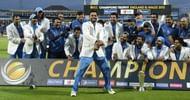 Dhoni (L) enjoys from the end as the team celebrates its 2013 Champions Trophy triumph