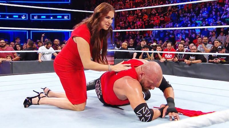 Stephanie McMahon helps Triple H up after Strowman&#039;s attack