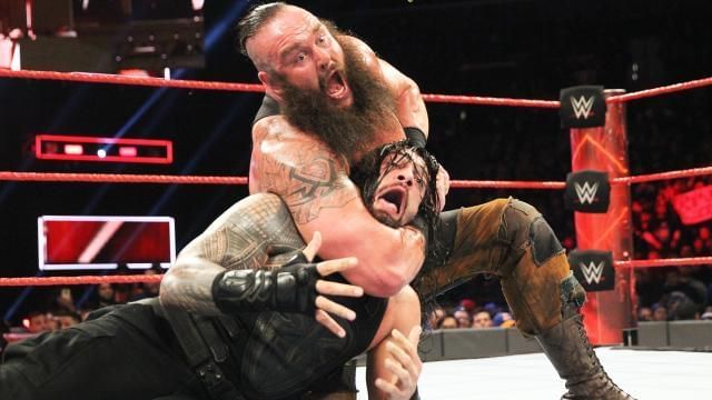 Braun Strowman in the ring with Roman Reigns