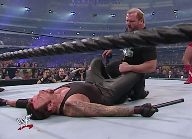 Double-A hits this spinebuster, but Triple H still has the nerve to think he can do his in the main event.