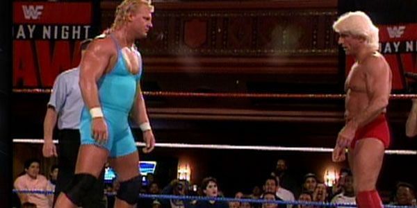 Two of the men in this picture would be involved in the best spot in this match, and the other is Mr. Perfect