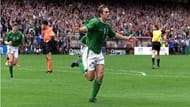 McAteer wheels off to celebrate his goal with the Lansdowne Road faithful.