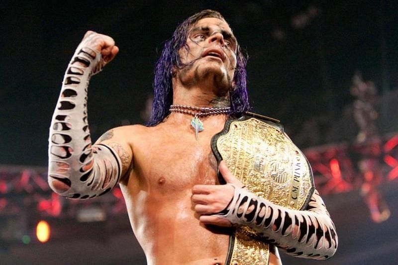 Jeff Hardy with the World Heavyweight Championship title
