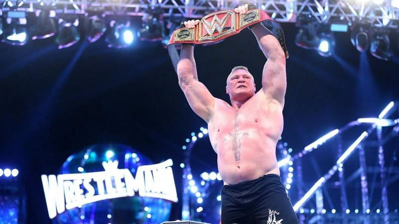 Brock Lesnar lifts the Universal Championship at WrestleMania 33