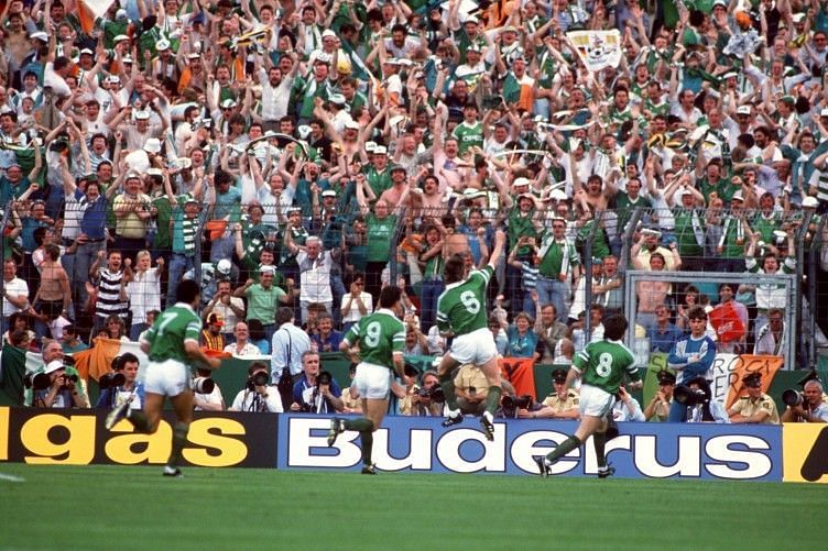Houghton celebrating his goal in front of the travelling Irish fans in Stuttgart