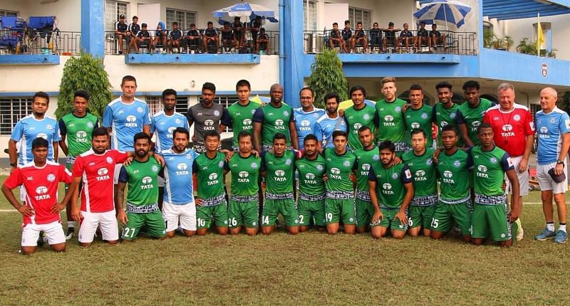 Jamshedpur in their green and blue away kit.