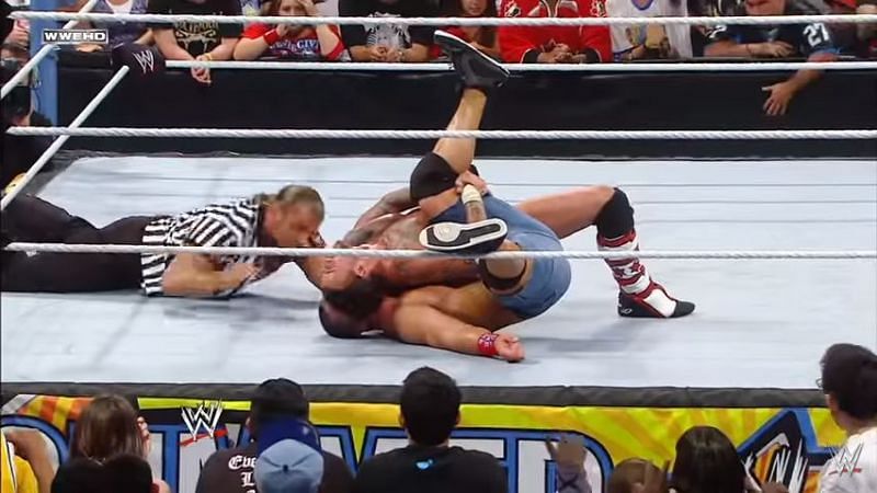 Triple H missed Cena&#039;s foot on the bottom rope.