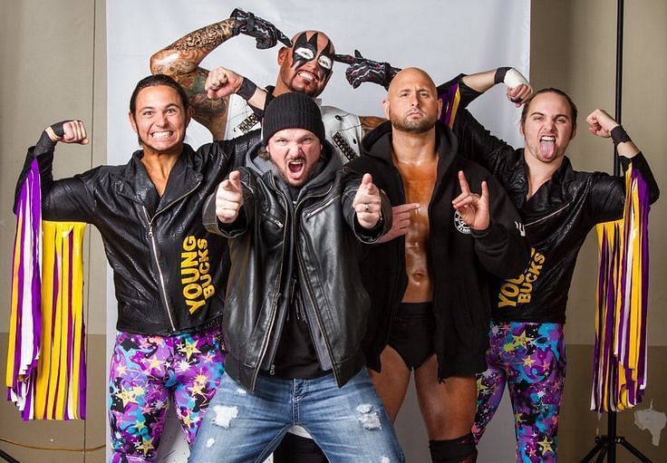 AJ Styles, Karl Anderson, Luke with The Young Bucks as part of the Biz Cliz
