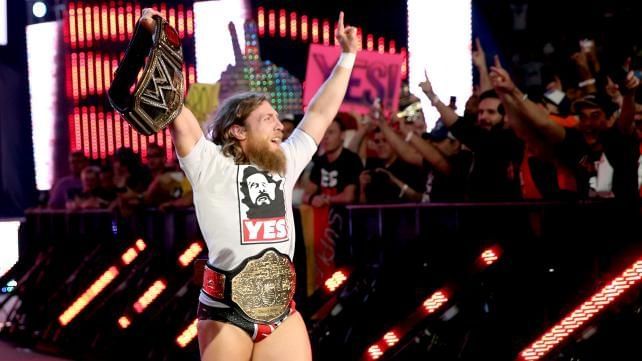 Daniel Bryan with the WWE and World Heavyweight Championship