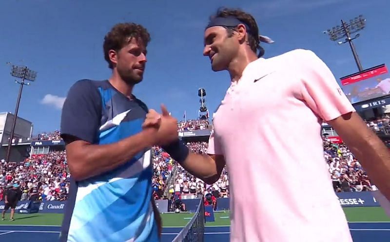 Haase and Federer interact after the game