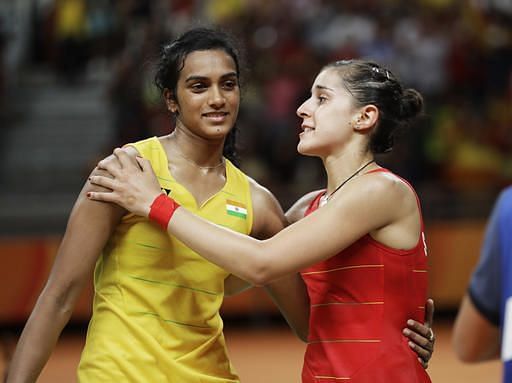 Sindhu (L) displayed tremendous sportsmanship after her loss to Marin (R)