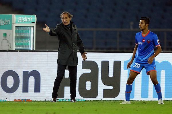 Delhi manager Miguel Portugal (left) was also sent off