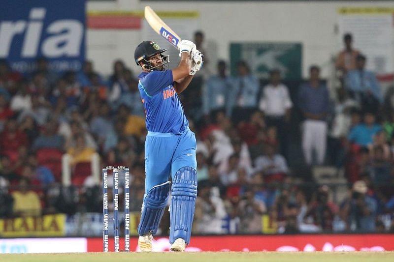 Rohit Sharma hits a six 