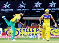 Ronit More bowling in KPL