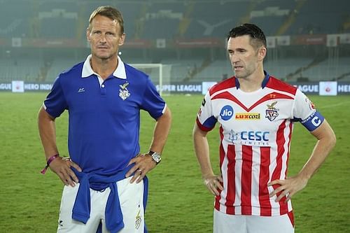 Teddy Sheringham and Robbie Keane. (Photo: ISL)