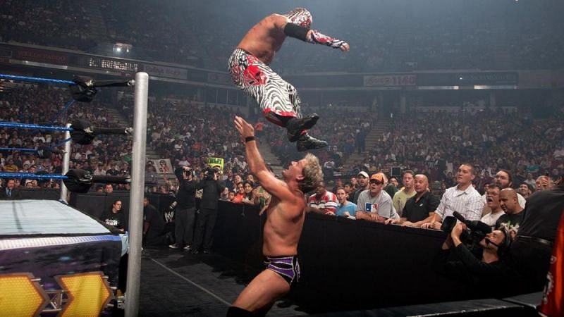 Rey Mysterio diving onto Chris Jericho