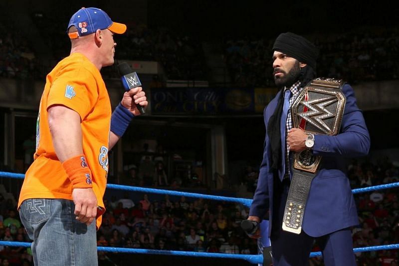 John Cena in the ring with Jinder Mahal