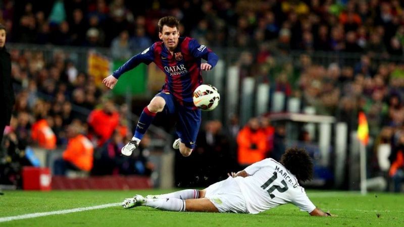 Enter captioMessi evading Marcelo&#039;s tackle. Image courtesy Soccer Nation.n