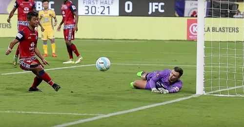 Enter captionRachubka saves a second attempt  during the Jamshedpur F.C. vs Kerala Blasters F.C. match.