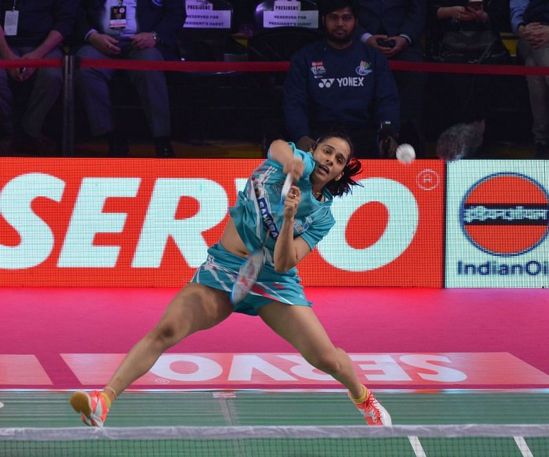World No. 10 Saina Nehwal in action against Michelle Li