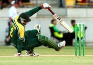 Pakistan's Inzimam ul Haq takes a tumble against N